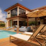 Modern villa with swimming pool and lounge area